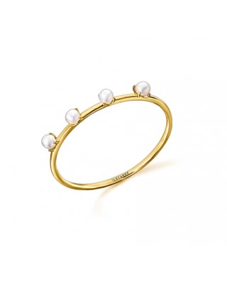 Anillo de oro de 18k con 4...